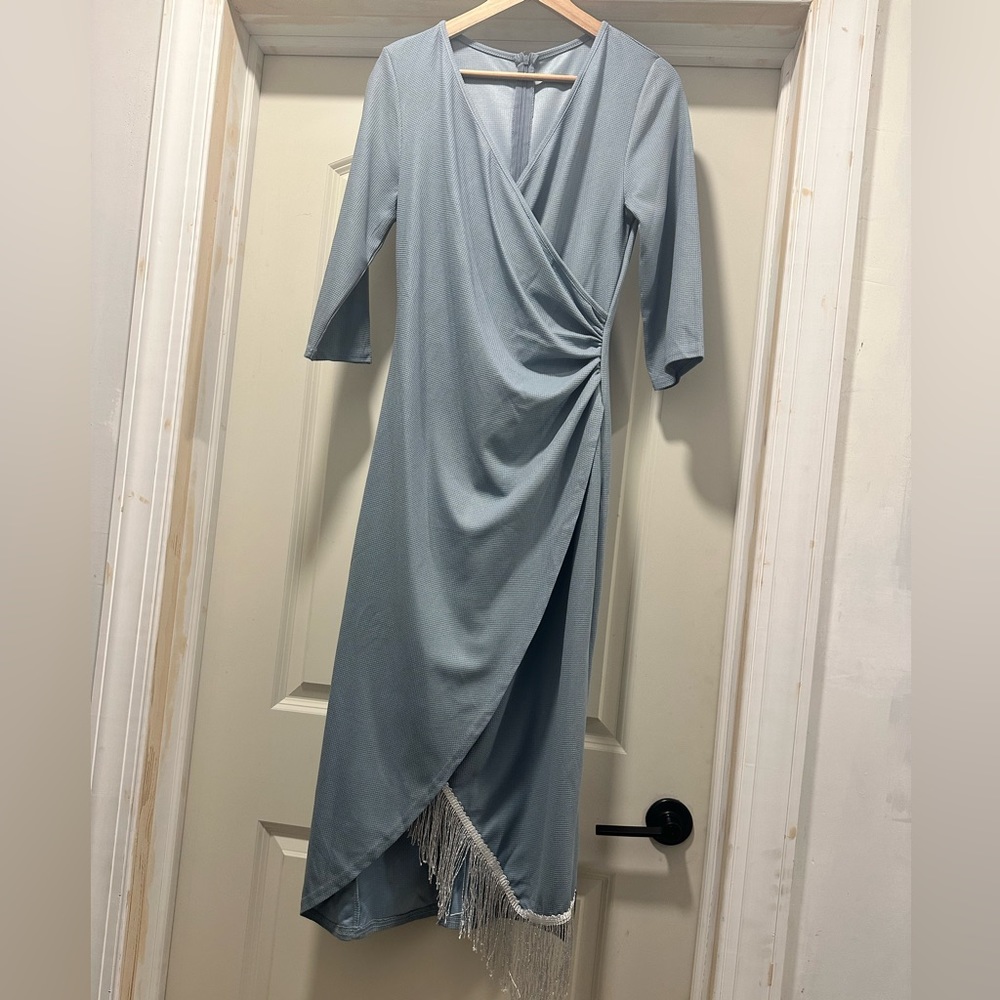 Blue, faux wrap dress with fringes.